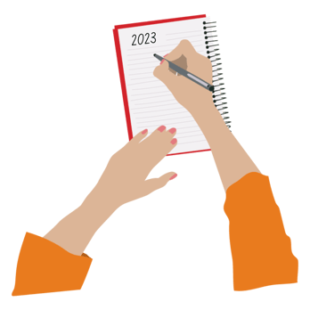 hands holding a pen writing on a notebook